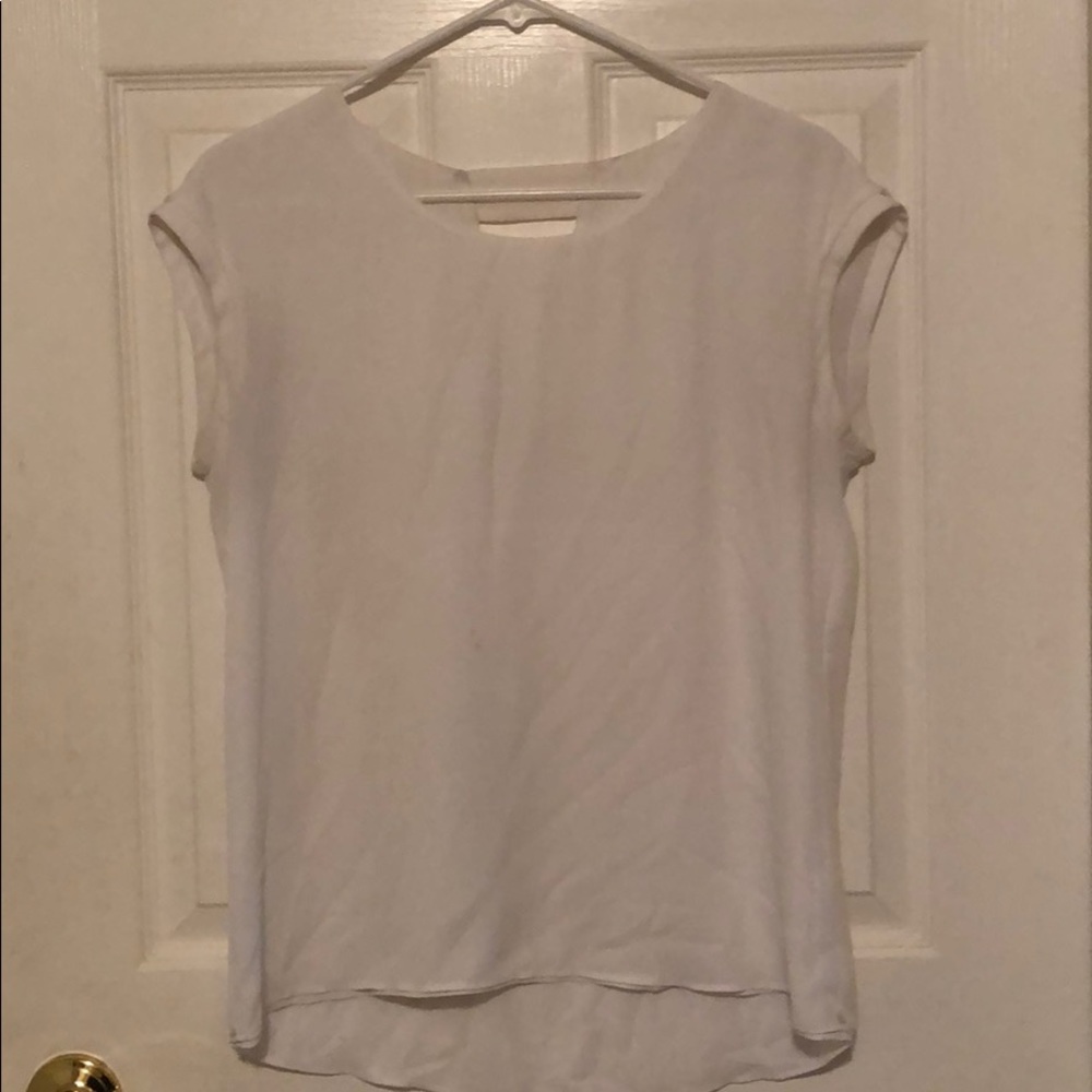 White polyester blouse with triangle cutout